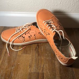 Orange flower cutout sneakers